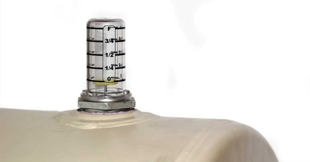 An oil tank fill gauge